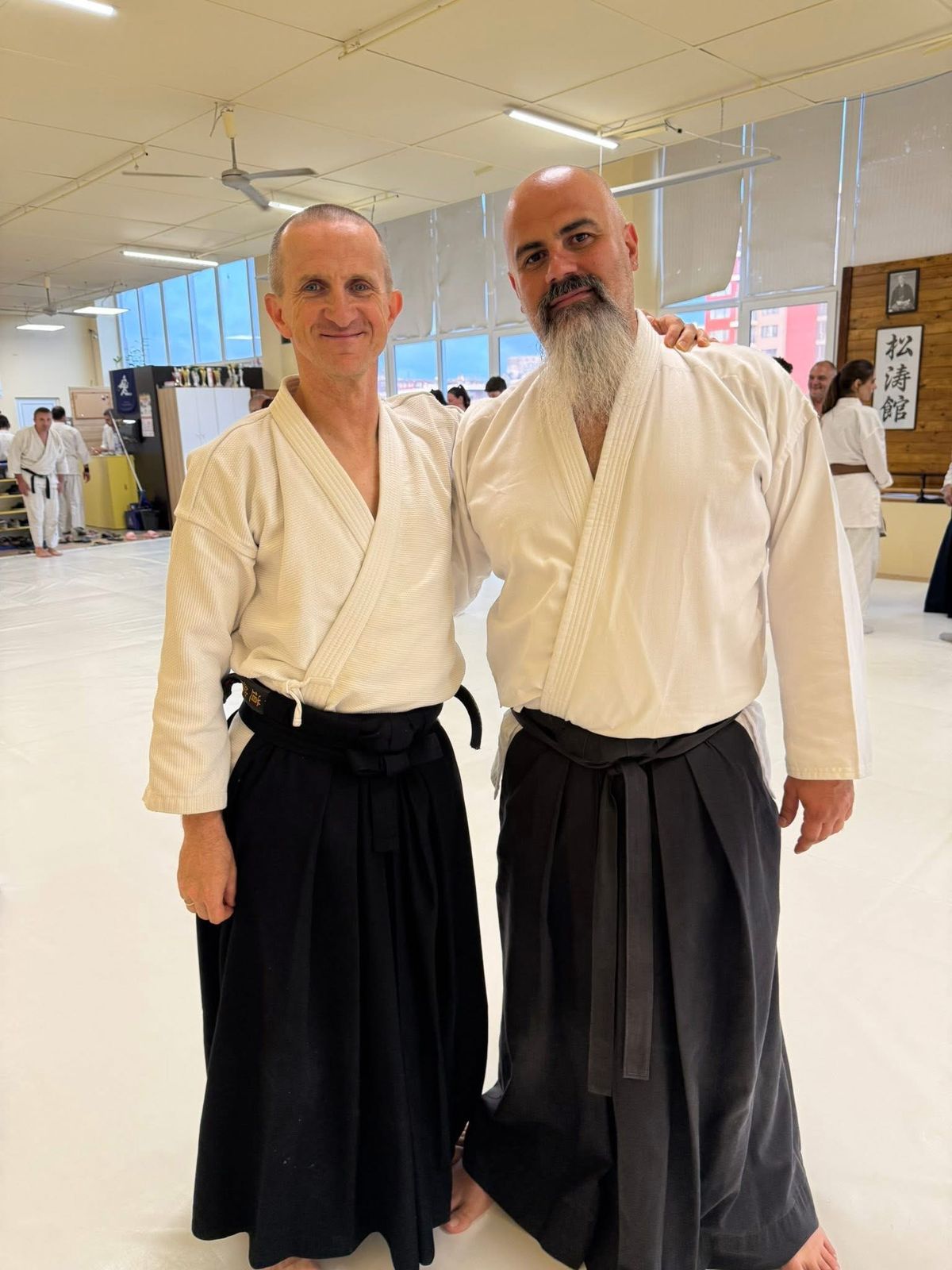 Sensei Elie Beam with a visiting sensei on the mat